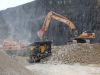 Tesab impact crusher and Case excavator in the rock processing demo area at Hillhead