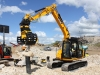 JCB excavator with selector grab attachment. Hillhead Quarrying & Recycling Show