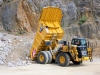 CAT off-highway truck. Hillhead quarry face demo area 1