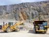 CAT large wheel loader and off-highway truck. Hillhead quarry face demo area