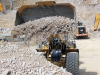 CAT large wheel loader. Hillhead quarry face demo area