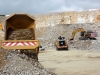 CAT articulated truck, large wheel loader and large excavator. Hillhead quarry face demo area