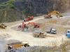 Cat, Doosan and Liebherr equipment at work. Hillhead quarry face demo area.