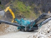 Powerscreen mobile screener. Rock processing demo area, Hillhead.