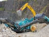 Powerscreen mobile screener. Rock processing demo area, Hillhead.